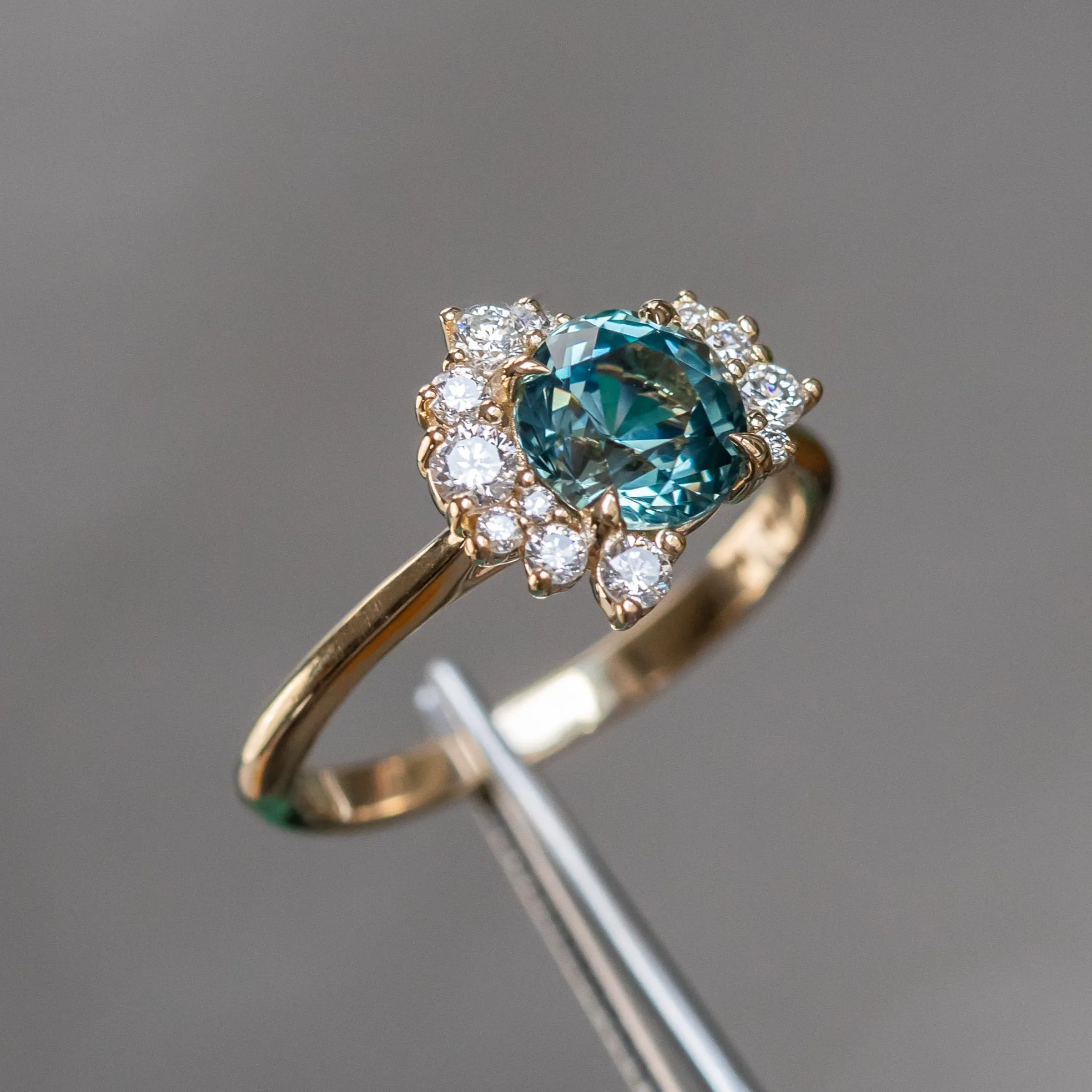 1.73ct Round Madagascar Teal Sapphire and Asymmetrical Diamond Cluster Ring in 14k Yellow Gold