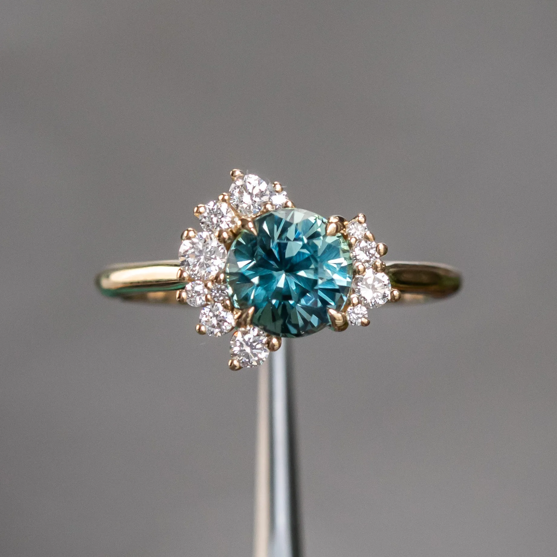 1.73ct Round Madagascar Teal Sapphire and Asymmetrical Diamond Cluster Ring in 14k Yellow Gold