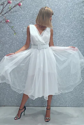 Abito princess bianco in tulle con corpetto a pois glitterati e cintura regolabile